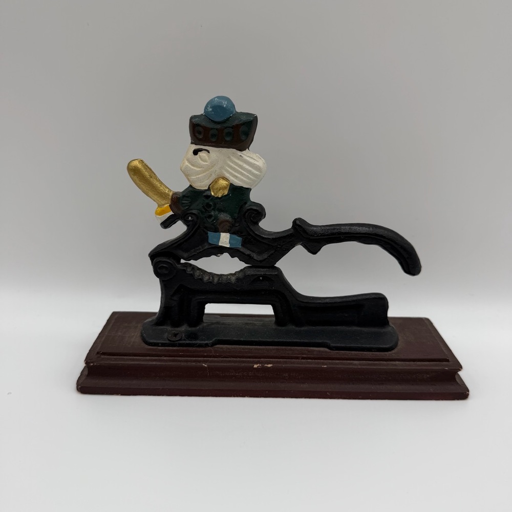 Vintage Hand-Painted Cast Iron Wooden Base Nutcracker Russian Soldier Christmas